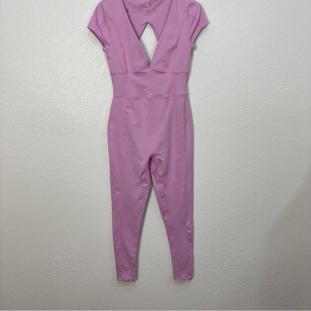 Elegant Pink Jumpsuit by free people cap sleeve athletic romper size small $128